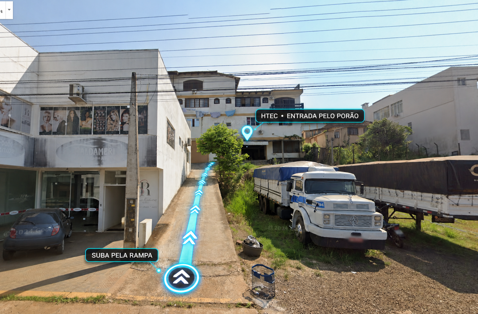 Fachada e rampa de acesso à Htec